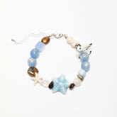 Ocean Dreams bracelet full front view with ceramic seagull and starfish charms