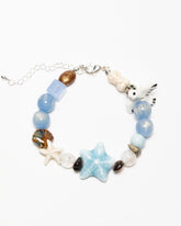 Ocean Dreams bracelet full front view with ceramic seagull and starfish charms