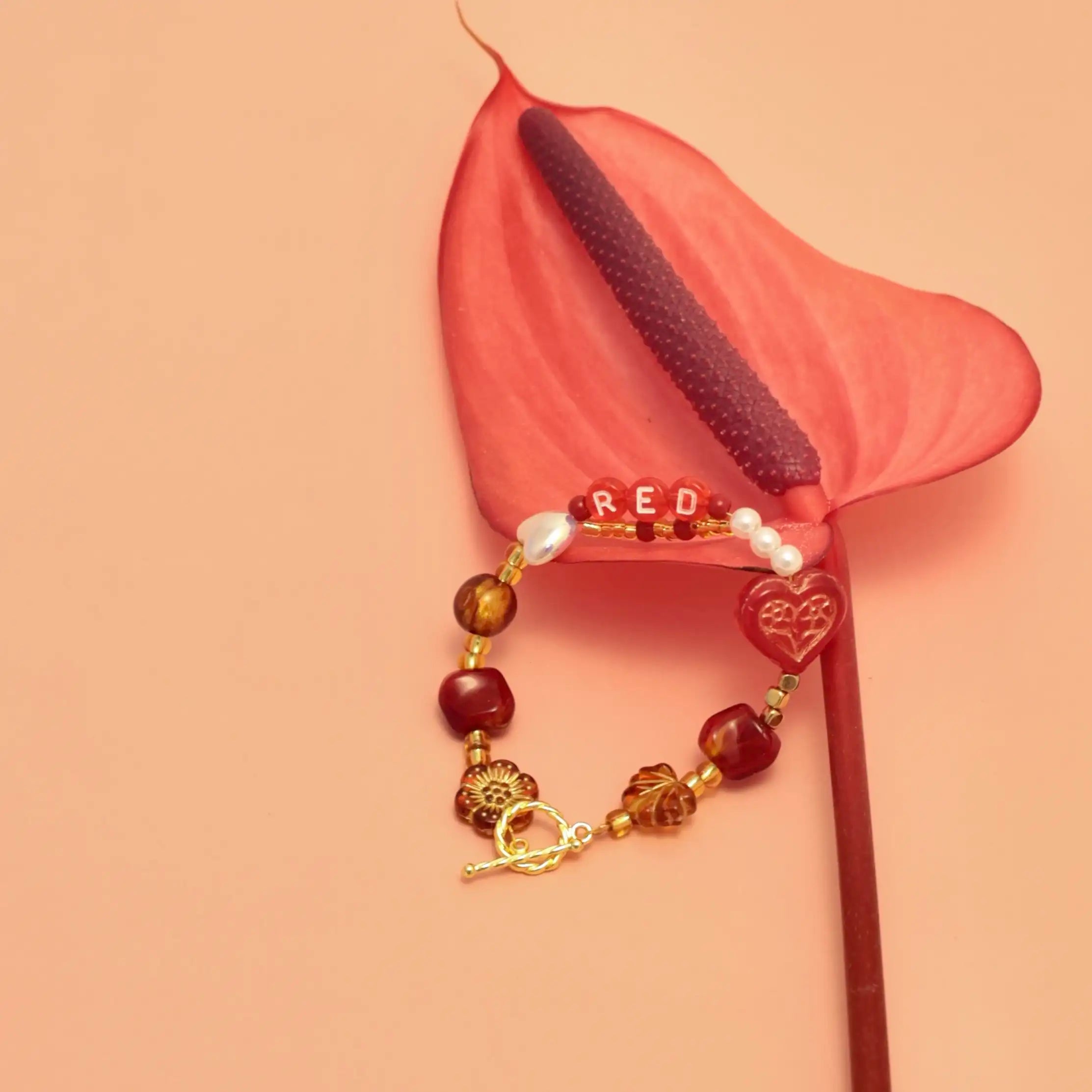 Detail view highlighting vintage clasp and red garnet beads