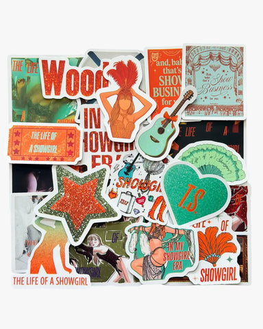 Vibrant red and teal stickers inspired by the Showgirl era, featuring stage outfits, guitars, and glitter stars.