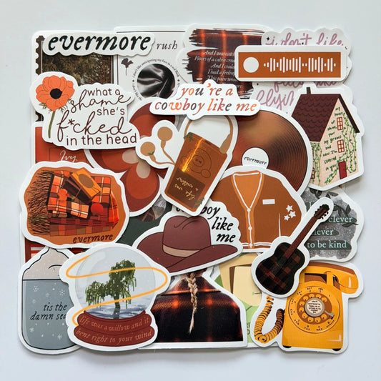Taylor Swift inspired evermore Swiftie stickers bundle with 50 different fan-made designs, warm autumn colors, storytelling visuals and cozy album mood