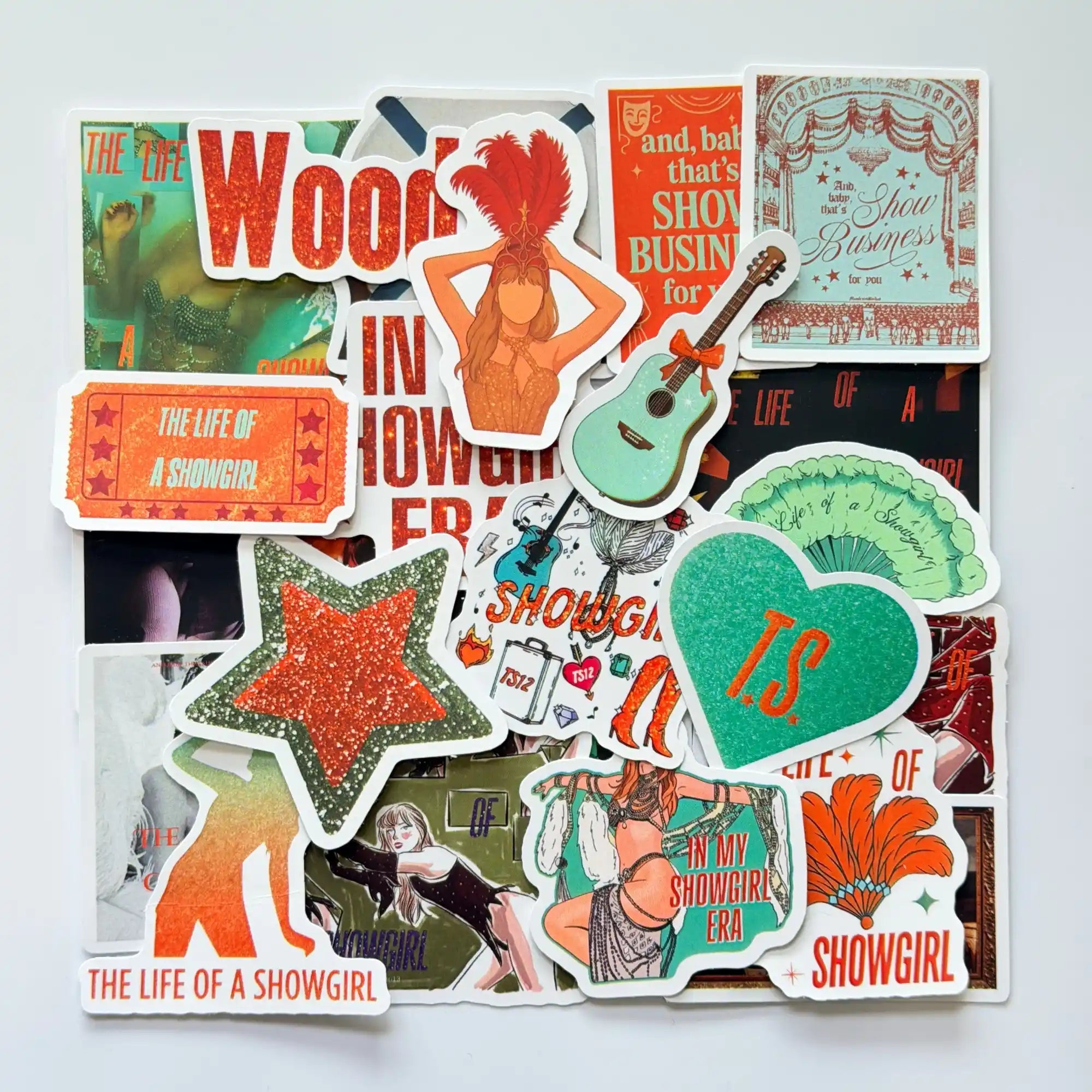 Taylor Swift inspired Showgirl era Swiftie stickers bundle featuring 50 different fan-made designs, stage costumes, bold colors and performance inspired visuals