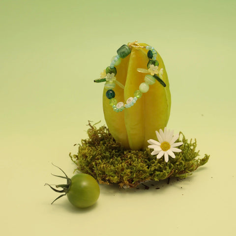 TS initial bracelet styled around green starfruit and daisy, whimsical styling